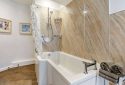 En-suite bath & shower at Bailiffgate
